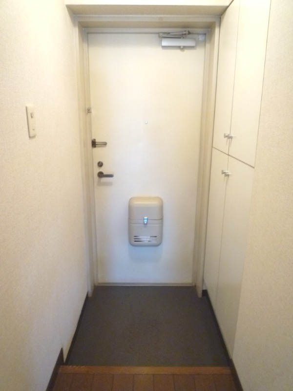 粟飯原マンション 玄関